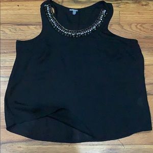 Black blouse with beaded necklaces